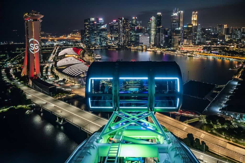 aerial view of a city and skyscrapers at night