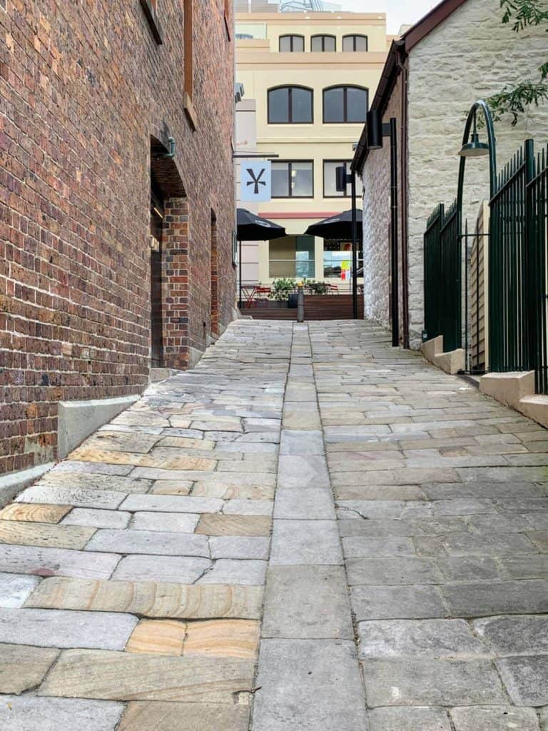 a cobbled laneway in a city