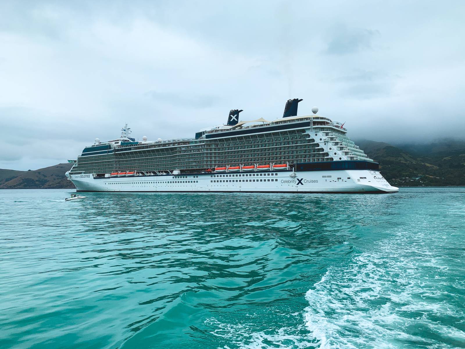 celebrity solstice cruise ship in the ocean with views of all the decks and balconies