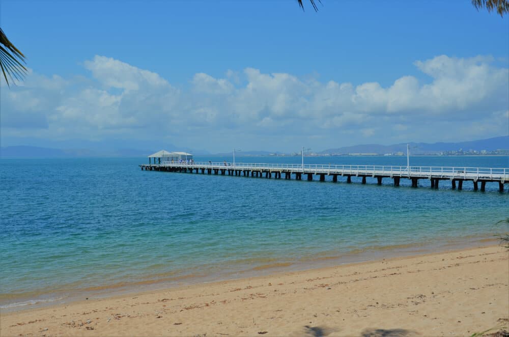 long old jetty and sandy beach on island is one of the best things to do on magnetic island