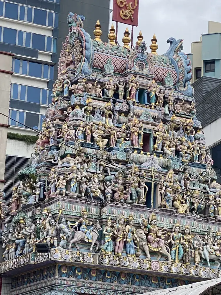 close upof intricate figurines on the Sri Veeramakaliamman Temple in little india singapore